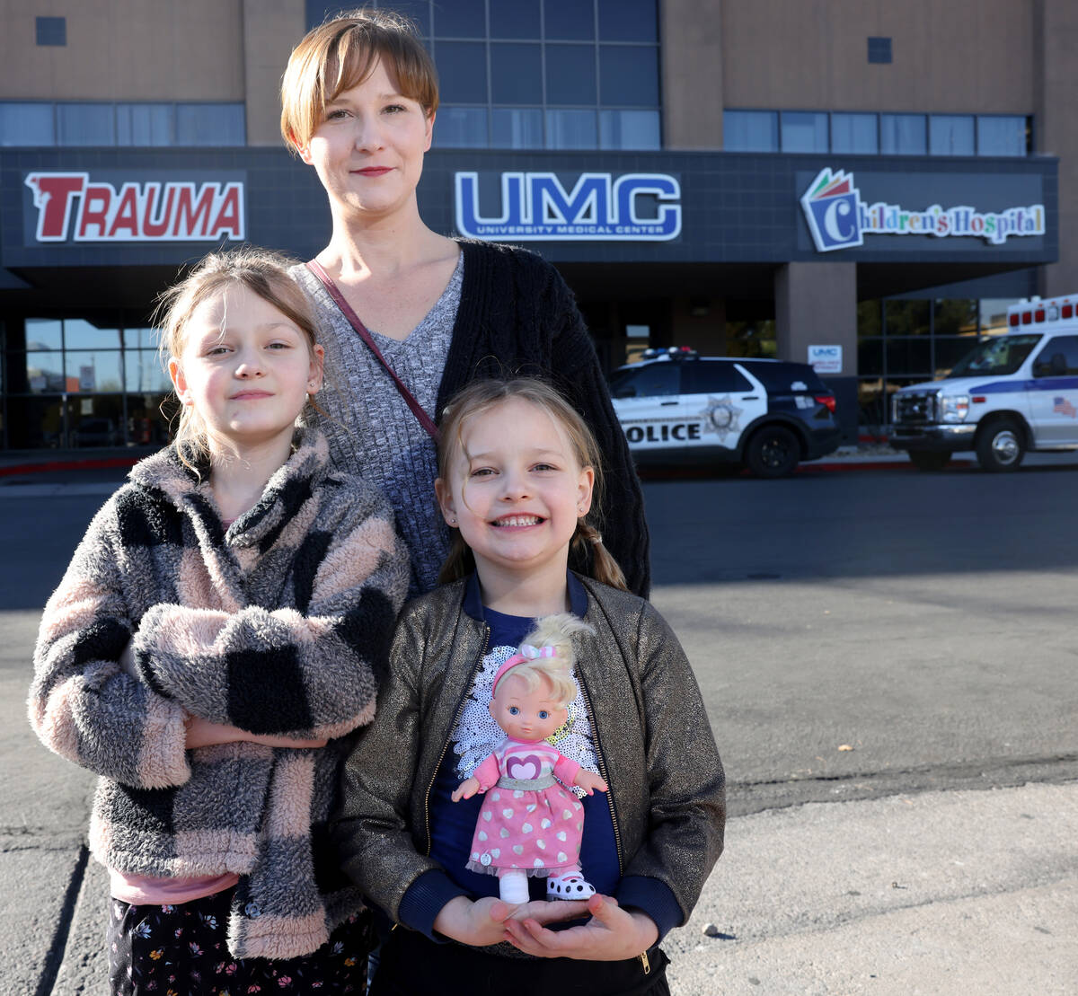 Jaimie Woodworth with her children Paige, 8, and Piper, 6, before a medical appointment at Univ ...