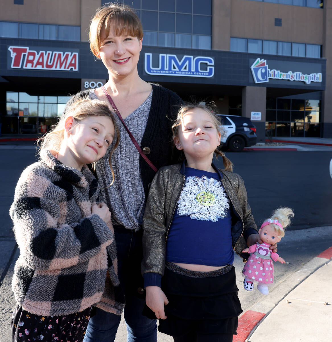 Jaimie Woodworth with her children Paige, 8, and Piper, 6, before a medical appointment at Univ ...