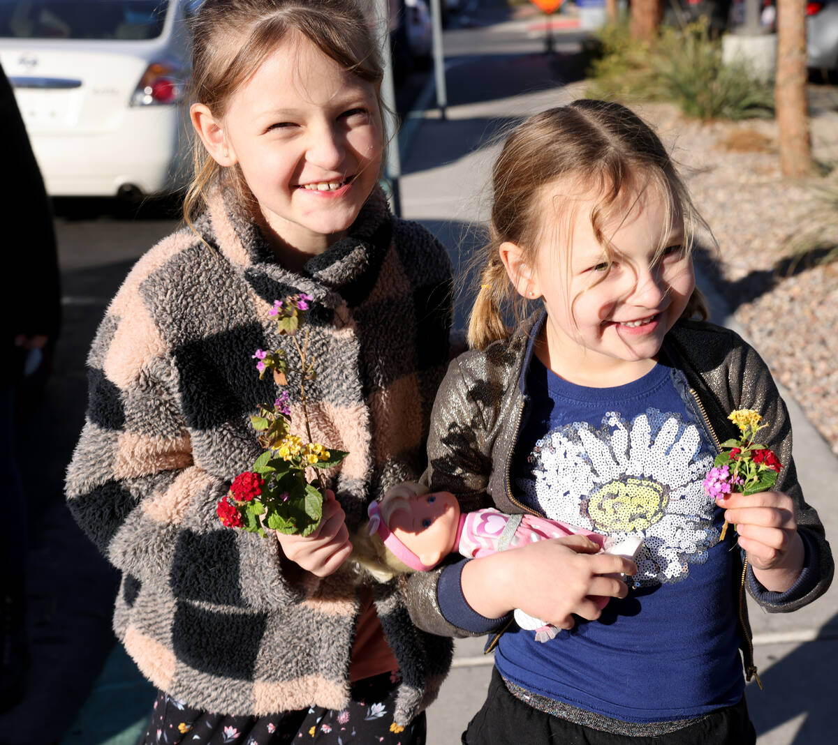 Paige Woodworth, 8, and her sister Piper, 6, before a medical appointment at University Medical ...