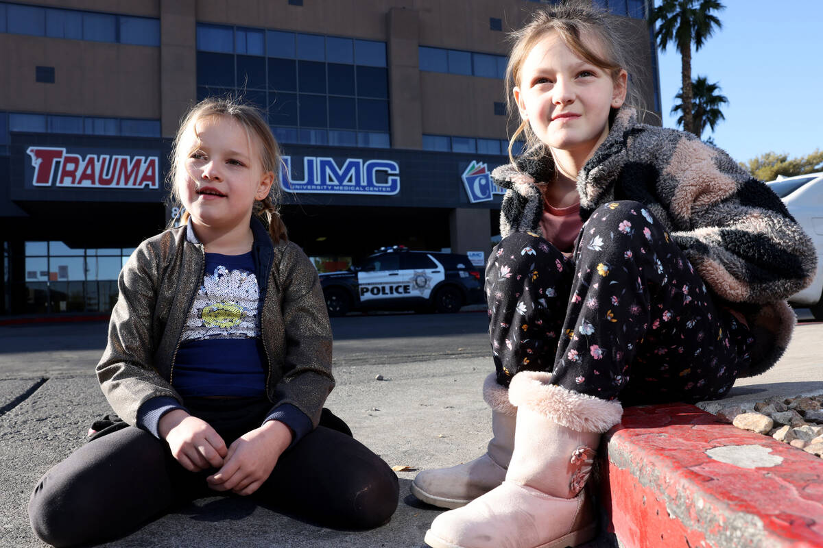 Piper Woodworth, 6, and her sister Paige, 8, before a medical appointment at University Medical ...