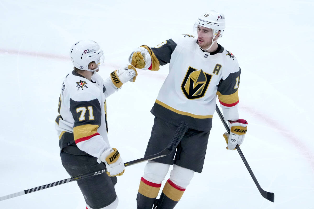 Vegas Golden Knights' Reilly Smith, right, celebrates his goal with William Karlsson during the ...
