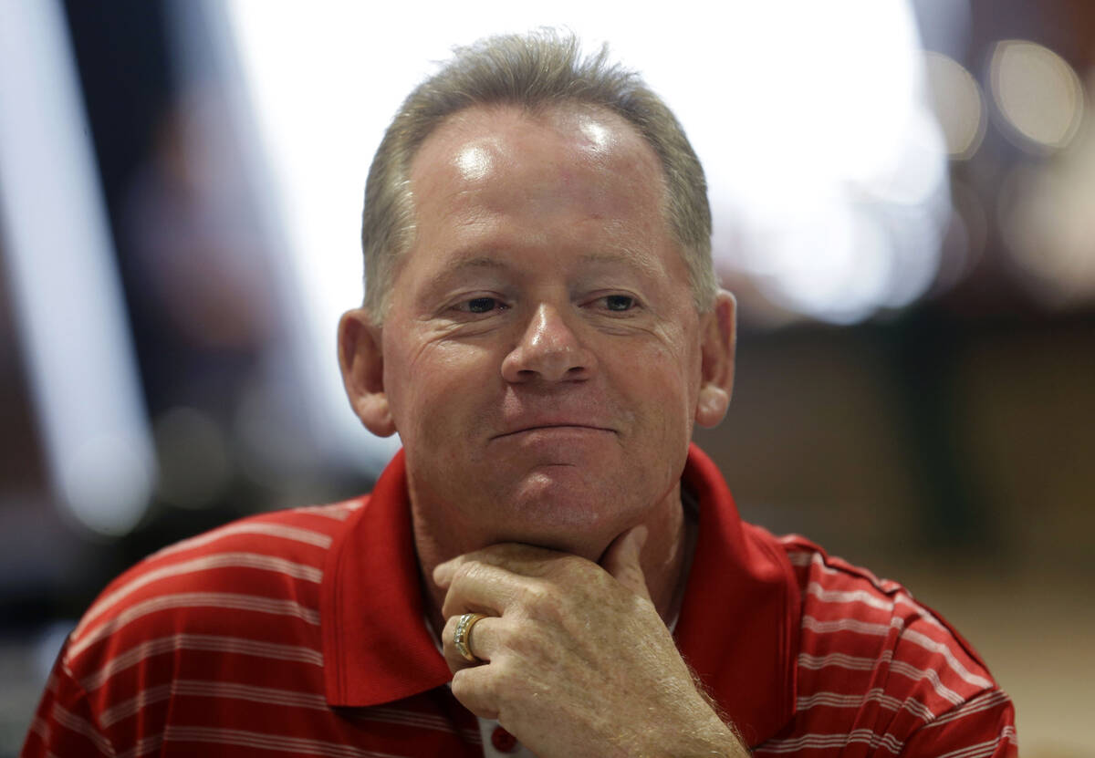 FILE - In this July 15, 2013 file photo, Western Kentucky head football coach Bobby Petrino spe ...