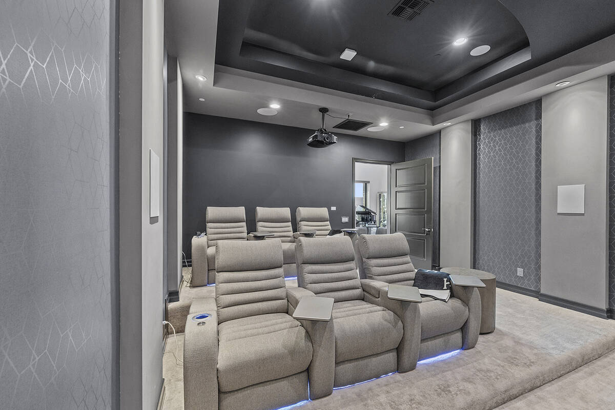 The home theater is one of the features of this 8,166-square-foot two-story estate. (Douglas El ...