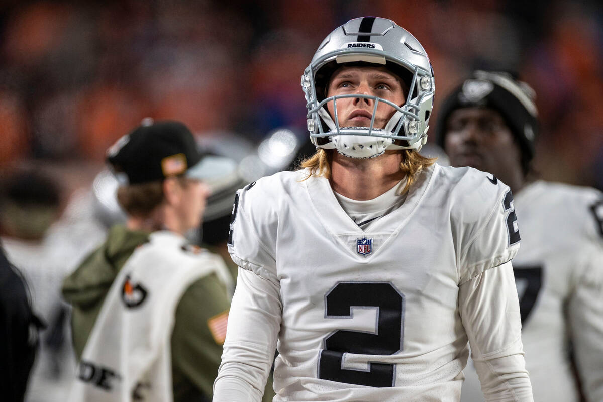 Raiders place kicker Daniel Carlson (2) looks to the replay monitor during the second half of a ...