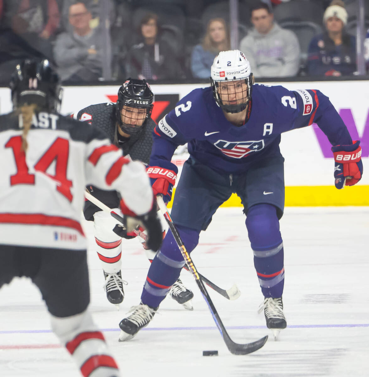 United States' Lee Stecklein (2) skates with the puck during the first period of a rivalry hock ...
