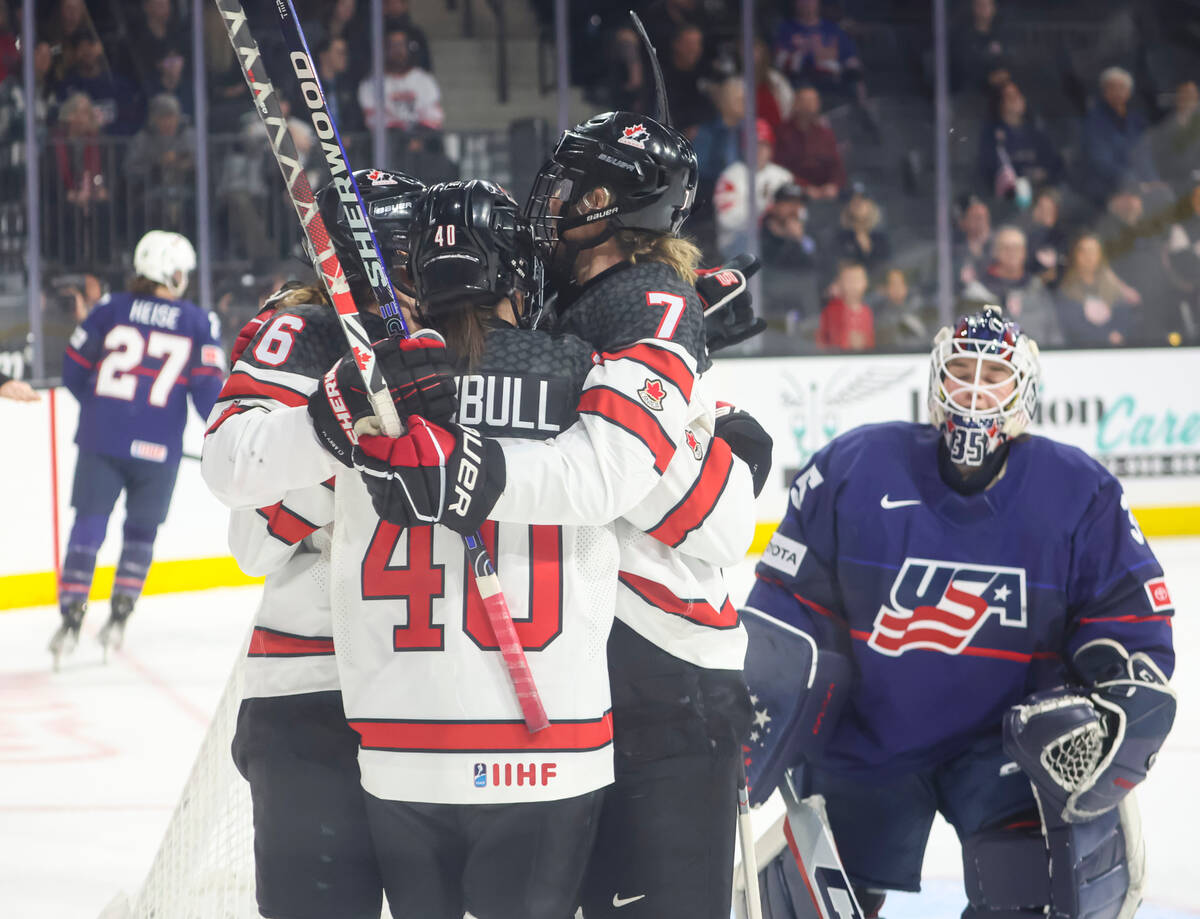 Canada celebrates a goal against the United States during the second period of a rivalry hockey ...