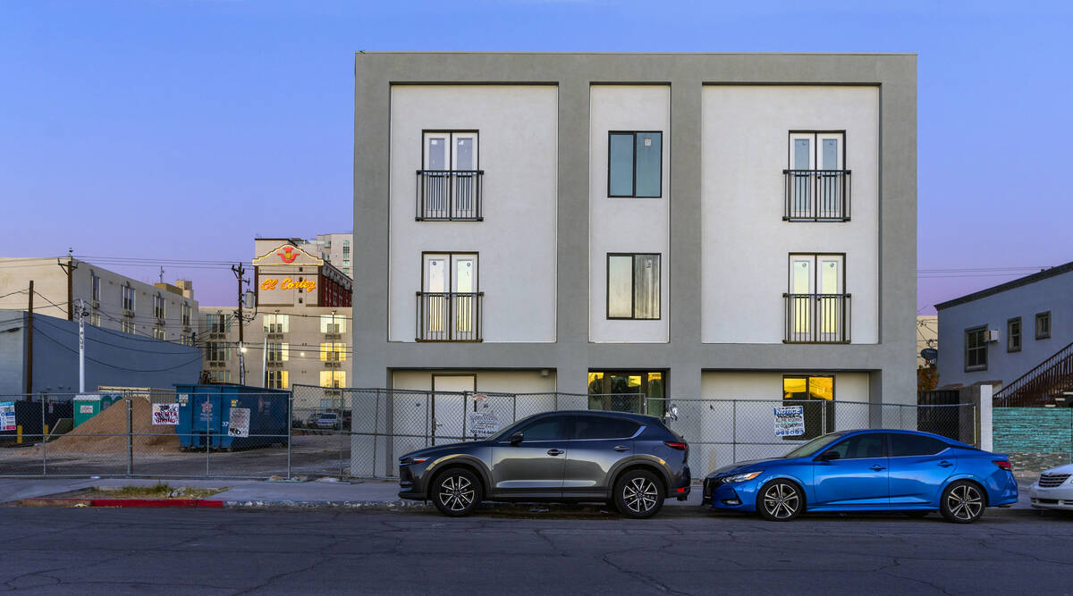 Morning light begins to illuminate the former Alpine Motel now under redevelopment and renamed ...