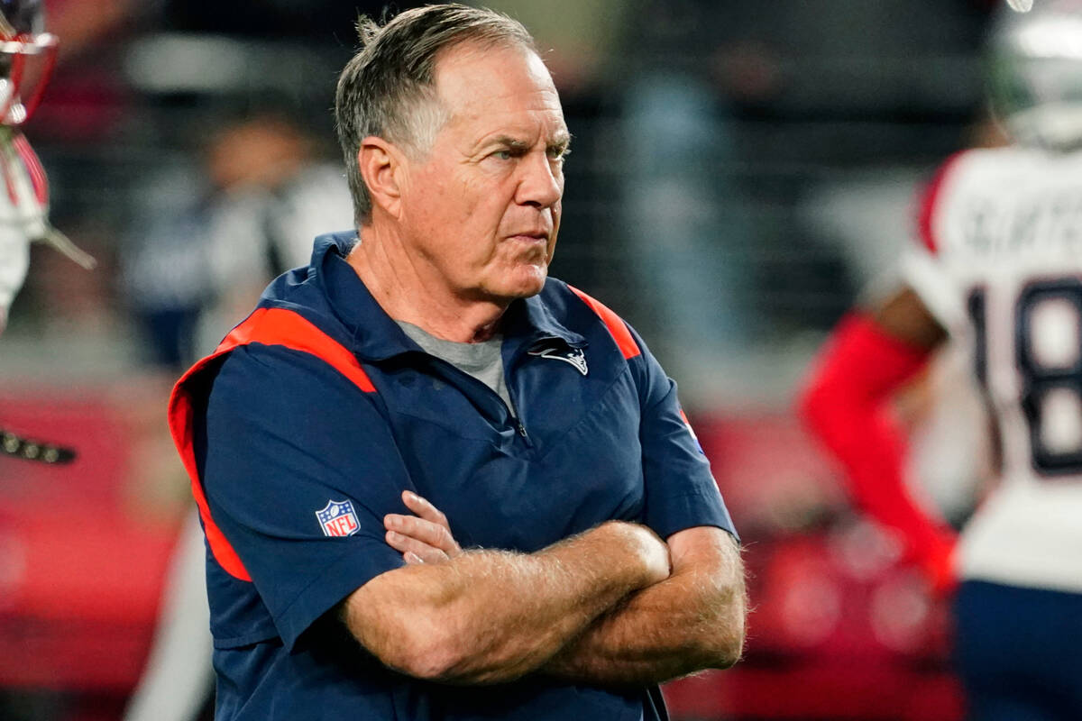 New England Patriots head coach Bill Belichick watches before an NFL football game against the ...