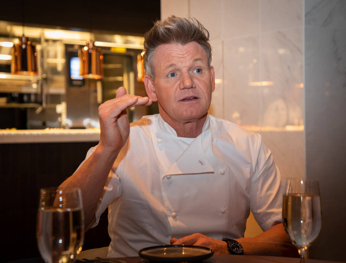 Chef Gordon Ramsay discusses his new Ramsay's Kitchen with invited guests at the restaurant in ...