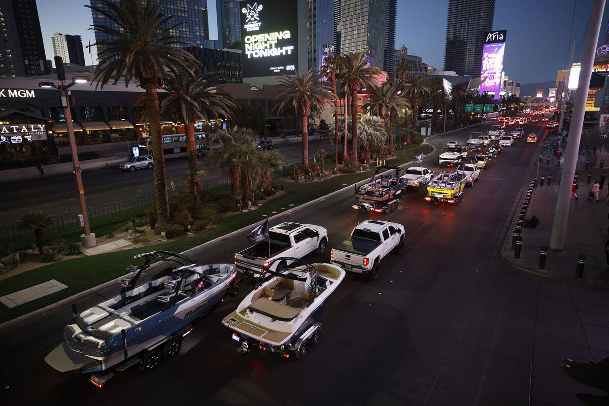 A parade of boats takes place on the Las Vegas Strip, Friday, Dec. 16, 2022, as boating enthusi ...