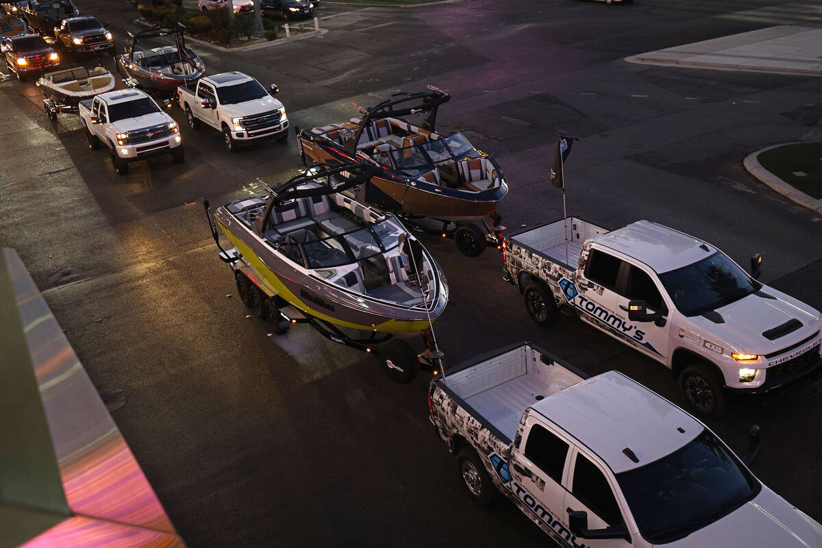 A parade of boats takes place on the Las Vegas Strip, Friday, Dec. 16, 2022, as boating enthusi ...