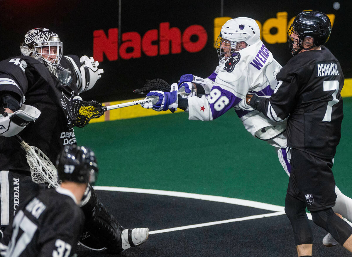 Desert Dogs goalie Landon Kells (42) takes a ball to the chest on a shot by Panther City forwar ...