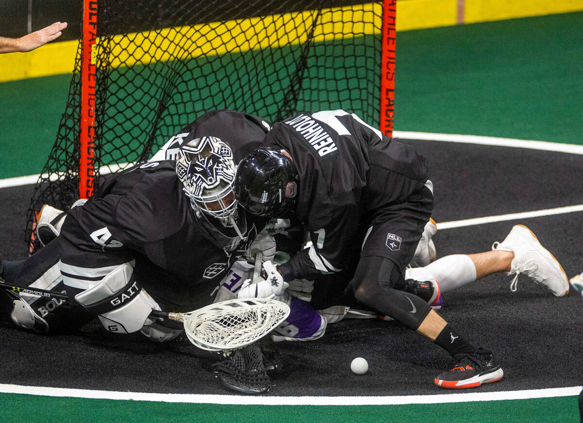 Desert Dogs goalie Landon Kells (42) smothers Panther City forward Cameron Wengreniuk (96) afte ...