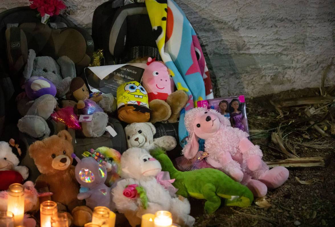 A candlelight vigil for Taelyr and Rose Wilmer is held at the site of the fatal car accident on ...