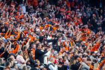 Oregon State Beavers fans cheer on their team versus the Florida Gators in their Las Vegas Bowl ...