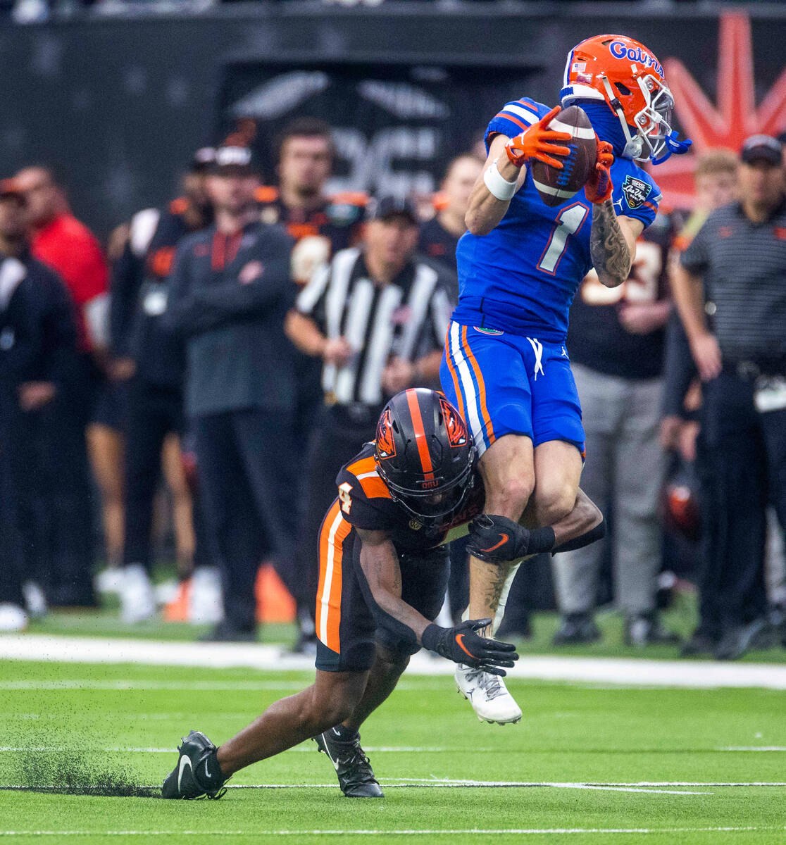 Florida Gators wide receiver Ricky Pearsall (1) elevates for a reception over Oregon State Beav ...
