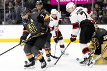 Golden Knights defenseman Alex Pietrangelo (7) deflects the puck with his skate while defensema ...