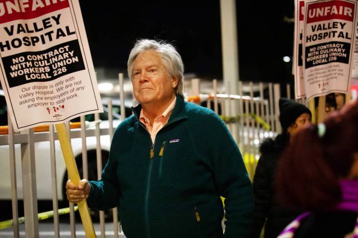 FILE - Clark County Commissioner Tick Segerblom joins the Culinary Union workers picket outside ...