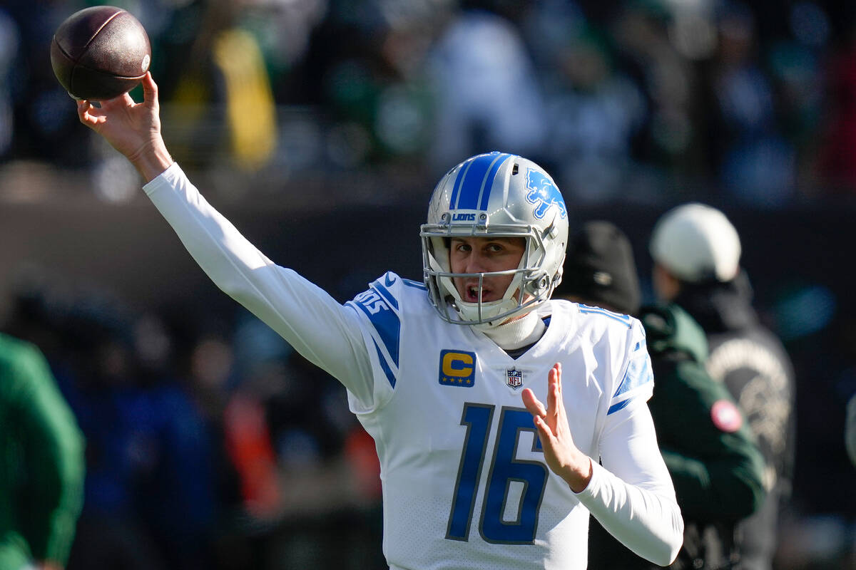 Detroit Lions quarterback Jared Goff (16) warms up before playing against the New York Jets in ...