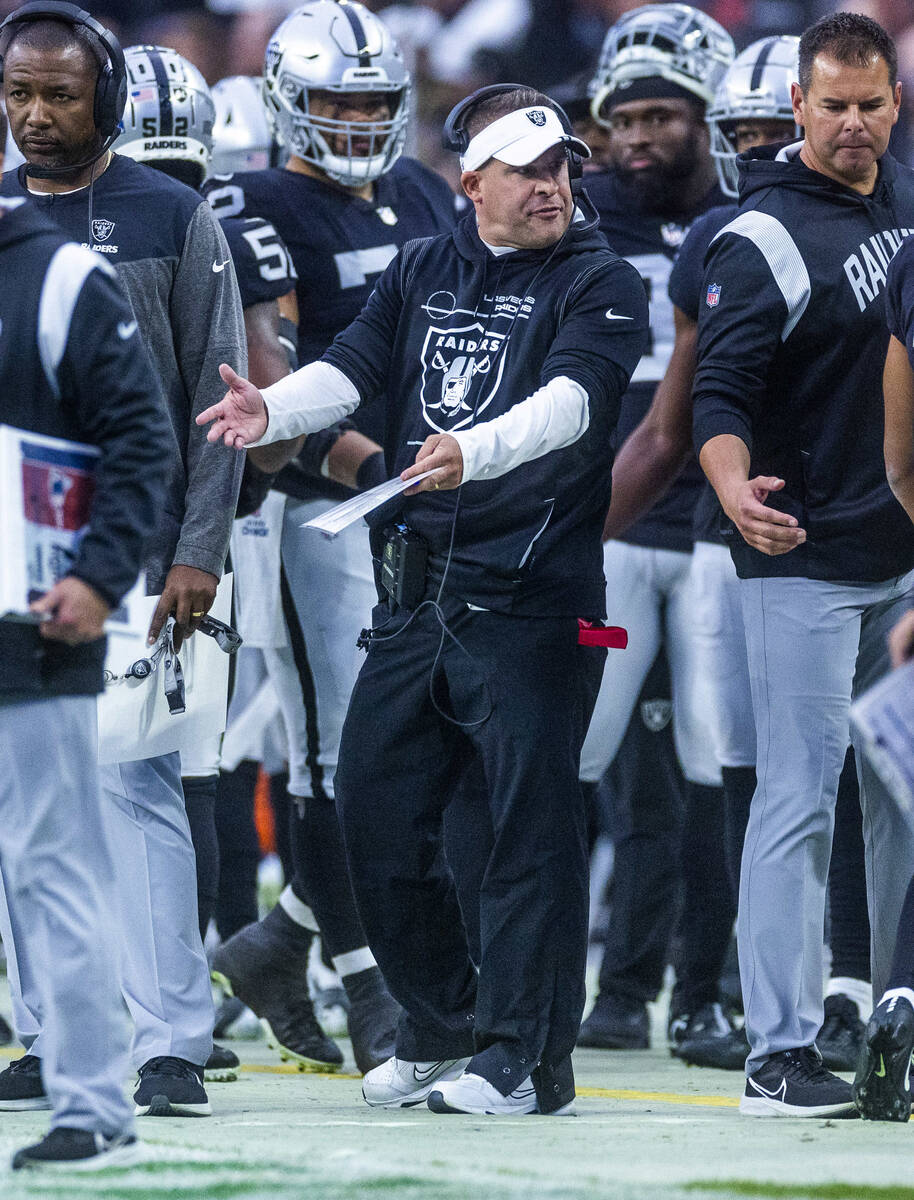 Raiders Head Coach Josh McDaniels argues a call on the sidelines versus the New England Patriot ...
