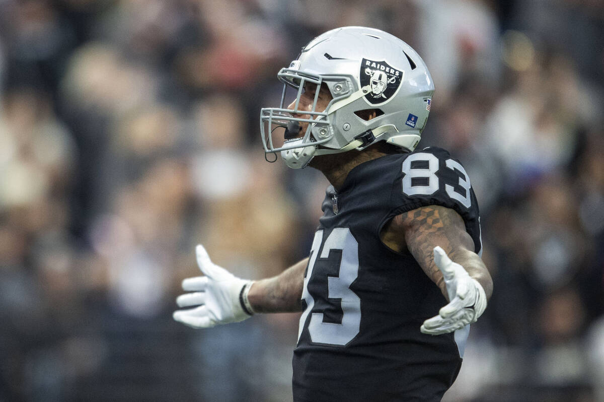 Raiders tight end Darren Waller (83) celebrates his touchdown during the first half of an NFL g ...