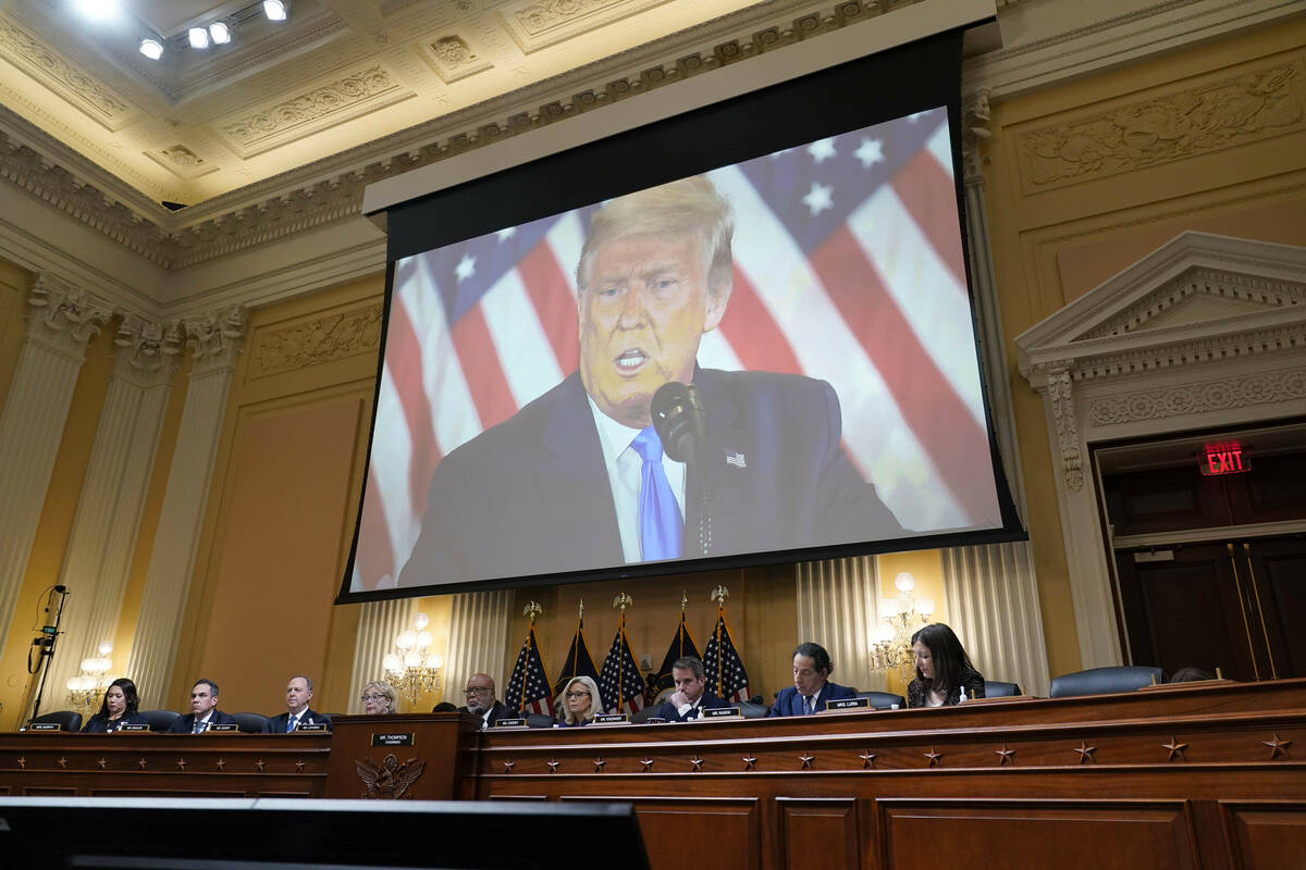 A video of former President Donald Trump is shown on a screen, as the House select committee in ...