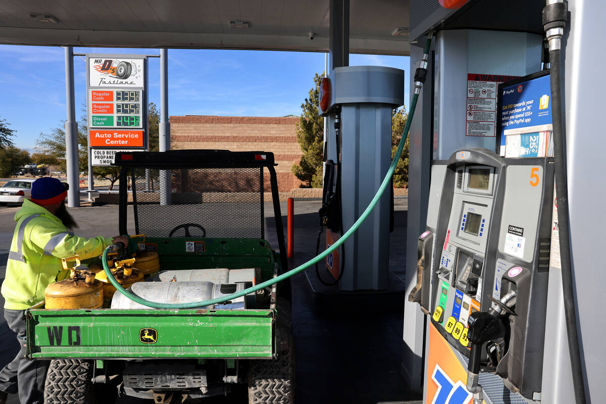 Steve Marzolf of Las Vegas fills up diesel fuel cans at a 76 station on South Boulder Highway a ...