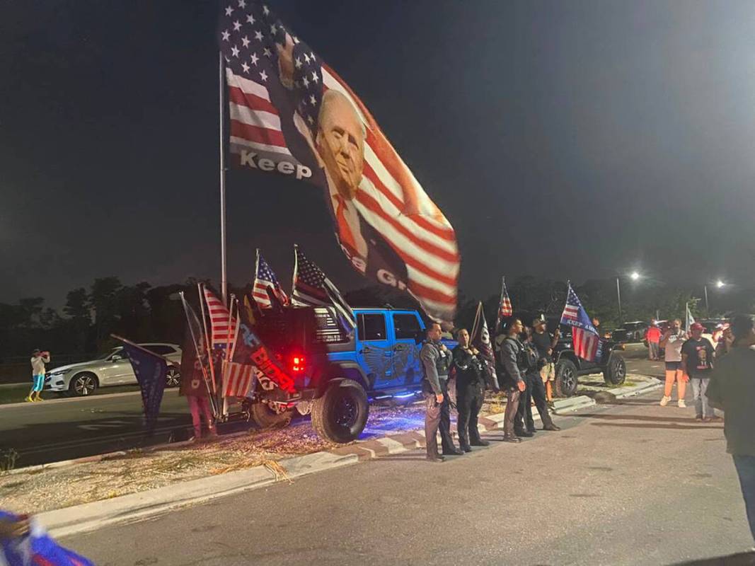Police standby at the approach to Mar-a-Lago in Palm Beach on Monday night, Aug. 9, 2022, as su ...