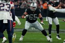 Las Vegas Raiders center Hroniss Grasu (65) blocks against the New England Patriots during the ...