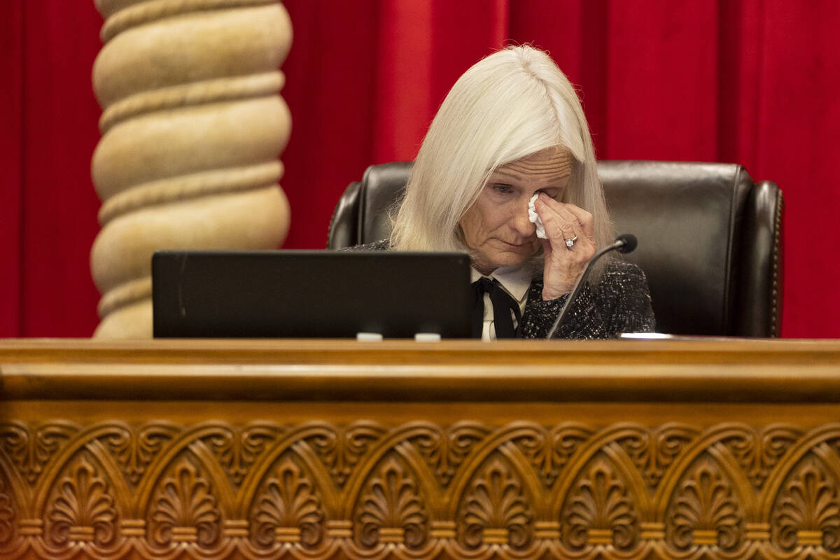 Chief Justice of the Supreme Court of Nevada Kristina Pickering listens to family testimony dur ...