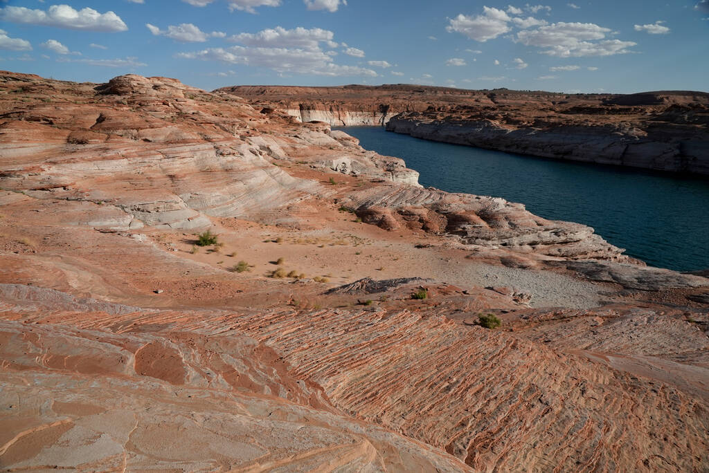 Bathtub rings show how low Lake Powell levels have dropped Tuesday, June 7, 2022, in Page, Ariz ...