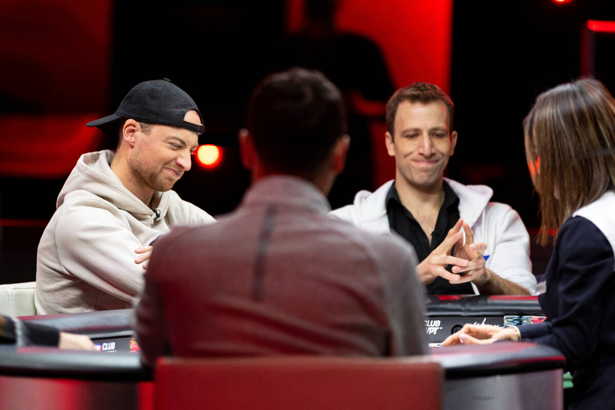 Colton Blomberg, left, and Benny Glaser, react after a play in the final table of the World Pok ...