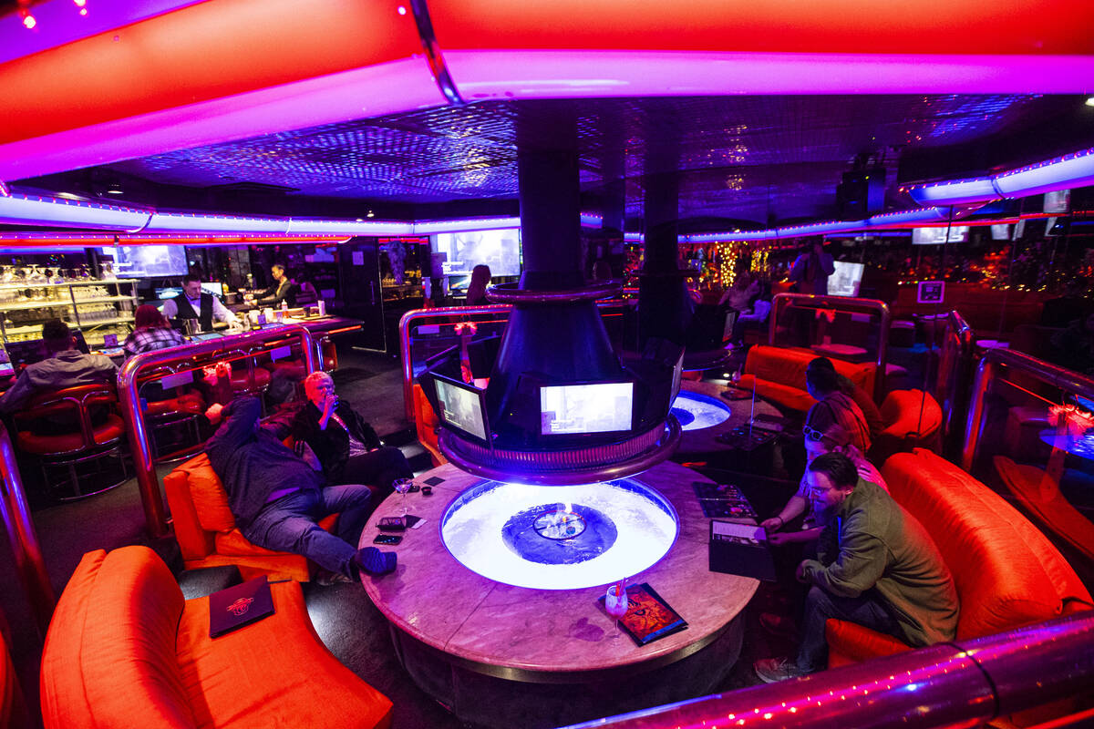 Patrons relax in the Fireside Lounge at Peppermill on Tuesday, Dec. 13, 2022, in Las Vegas. The ...