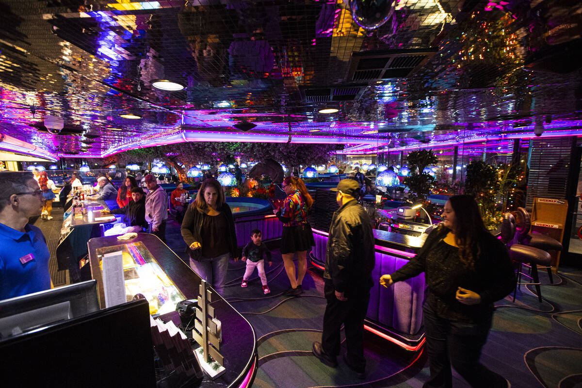 Patrons are led to their seats at Peppermill on Tuesday, Dec. 13, 2022, in Las Vegas. The famed ...