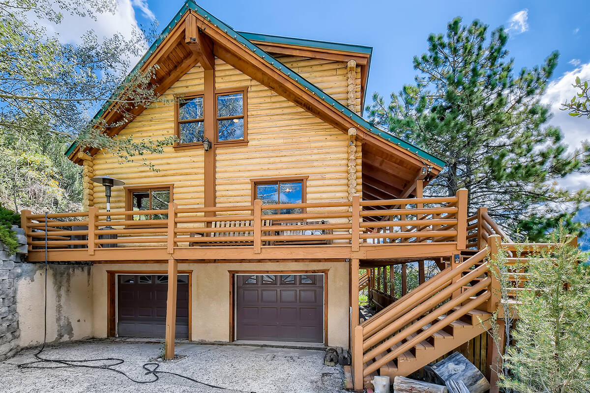 The fully renovated two-story Christmas cabin on Mount Charleston lists for $1.795 million. (Mt ...