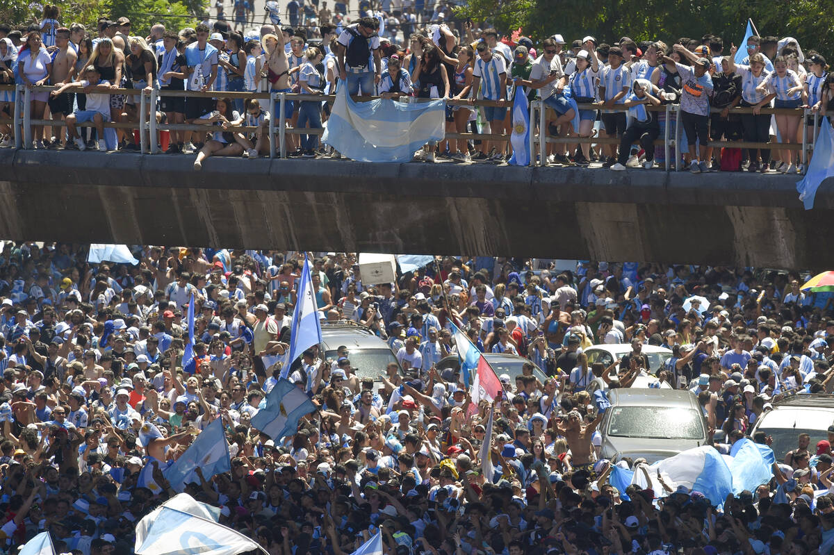 Soccer fans descend on the capital's downtown for a homecoming parade for the Argentine soccer ...