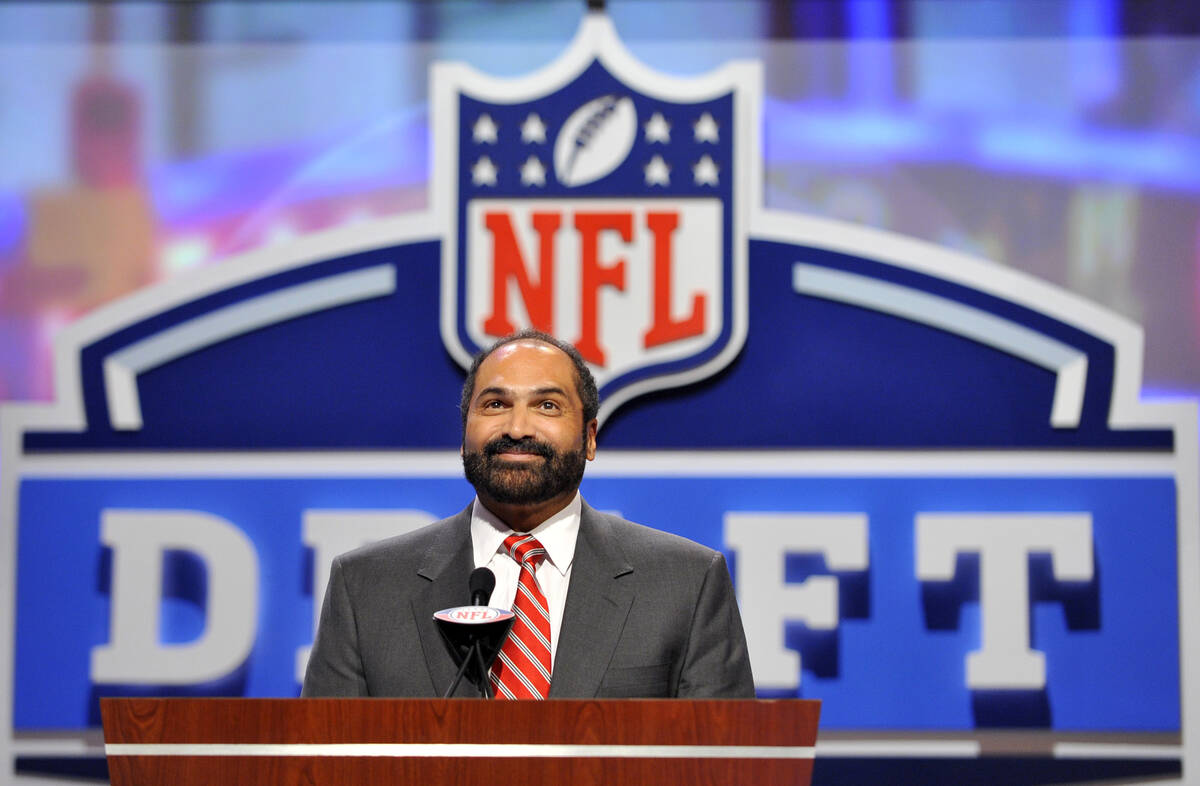 FILE - Hall of Fame Pittsburgh Steeler Franco Harris announces a draft pick during the second r ...