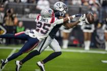 New England Patriots cornerback Marcus Jones (25) defends a pass intended for Raiders wide rece ...