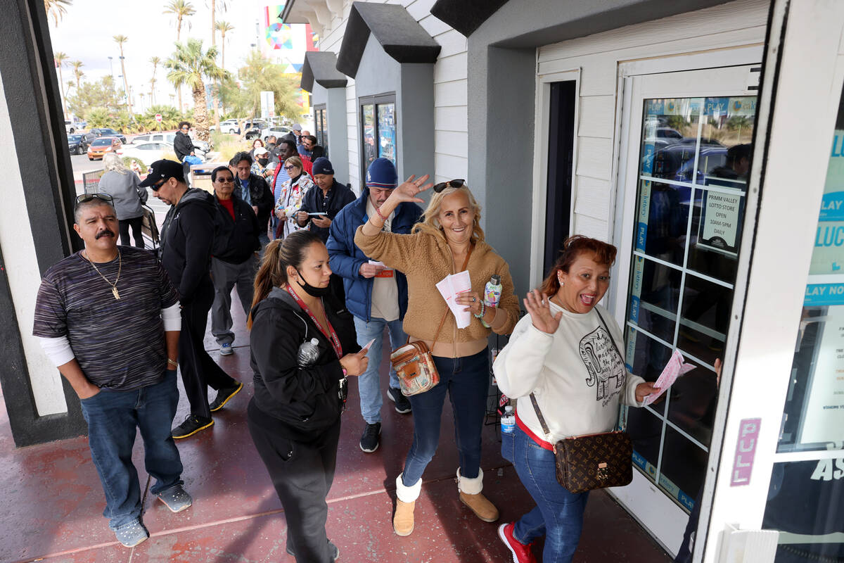 Jessica Palomino, from left, Rosa Plata and Ana Santiaguin, all of Las Vegas, wait in line to b ...