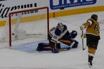 Golden Knights right wing Mark Stone (61) scores past St. Louis Blues goaltender Jordan Binning ...