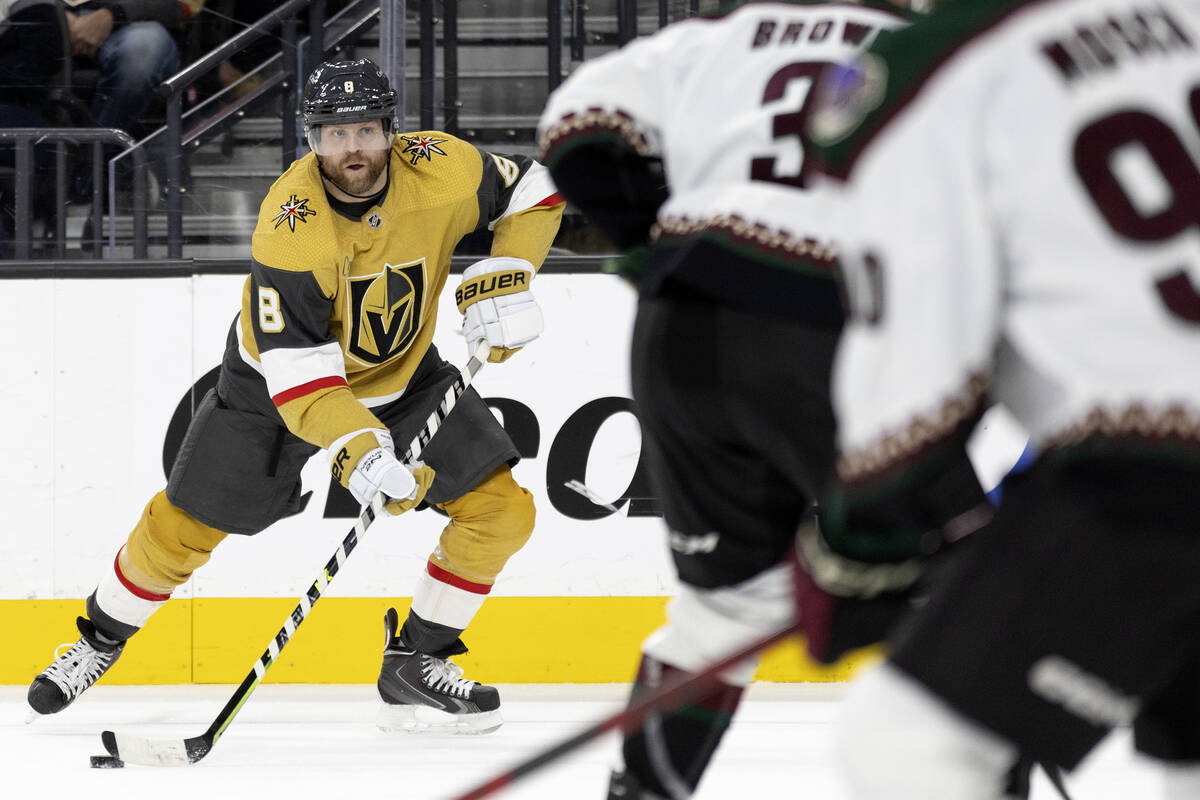 Golden Knights center Phil Kessel (8) looks for an opening in the Coyotes line during the third ...