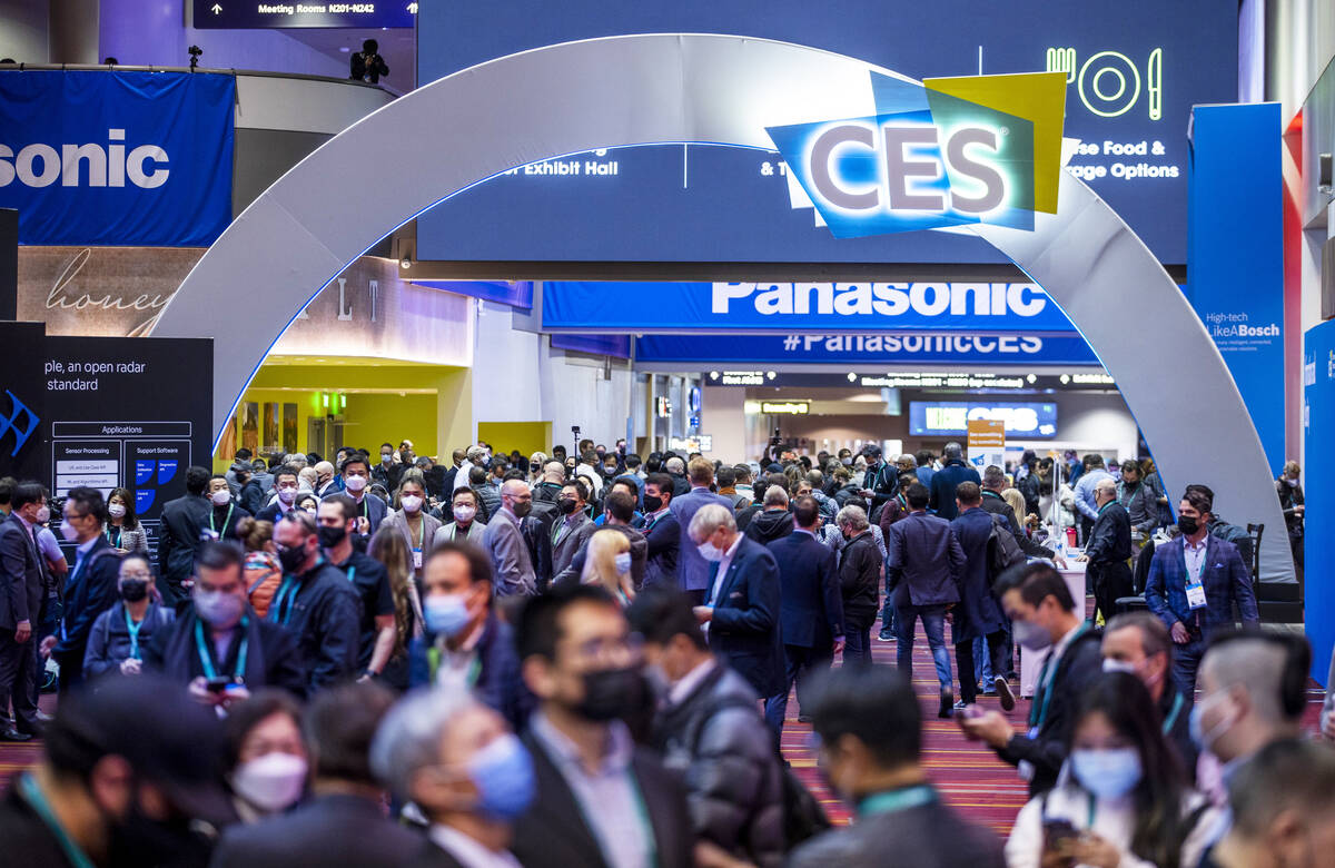 Attendees move about Central Hall during the first day of CES at the Las Vegas Convention Cente ...