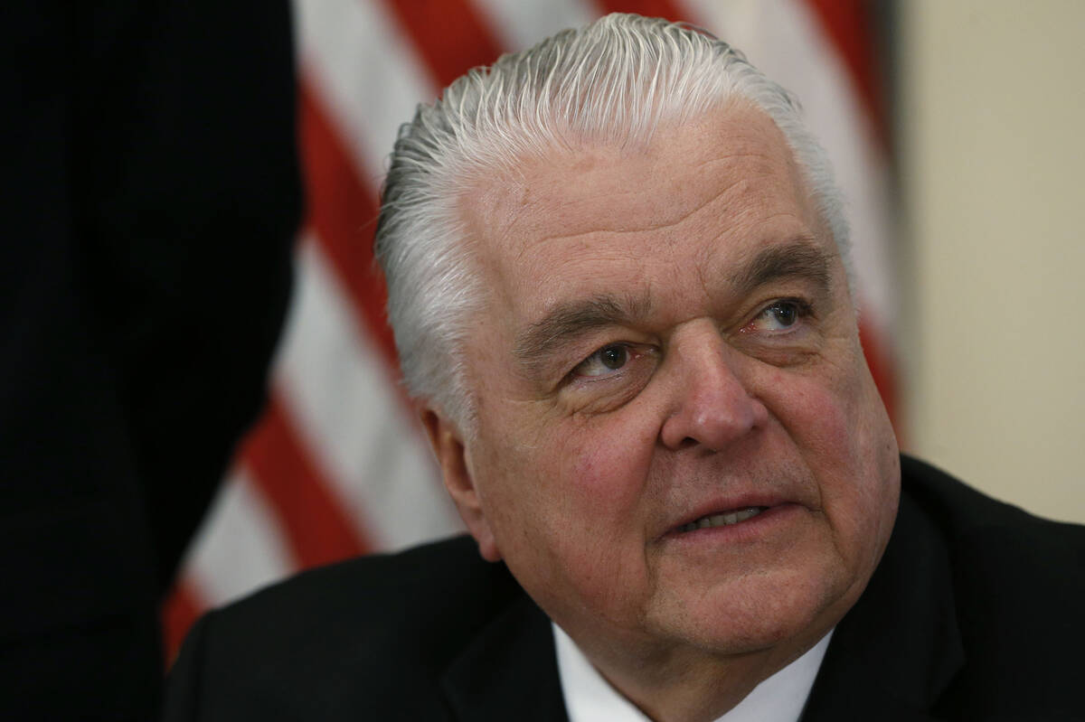 Nevada Gov. Steve Sisolak signs an executive order calling for a task force to address sexual h ...