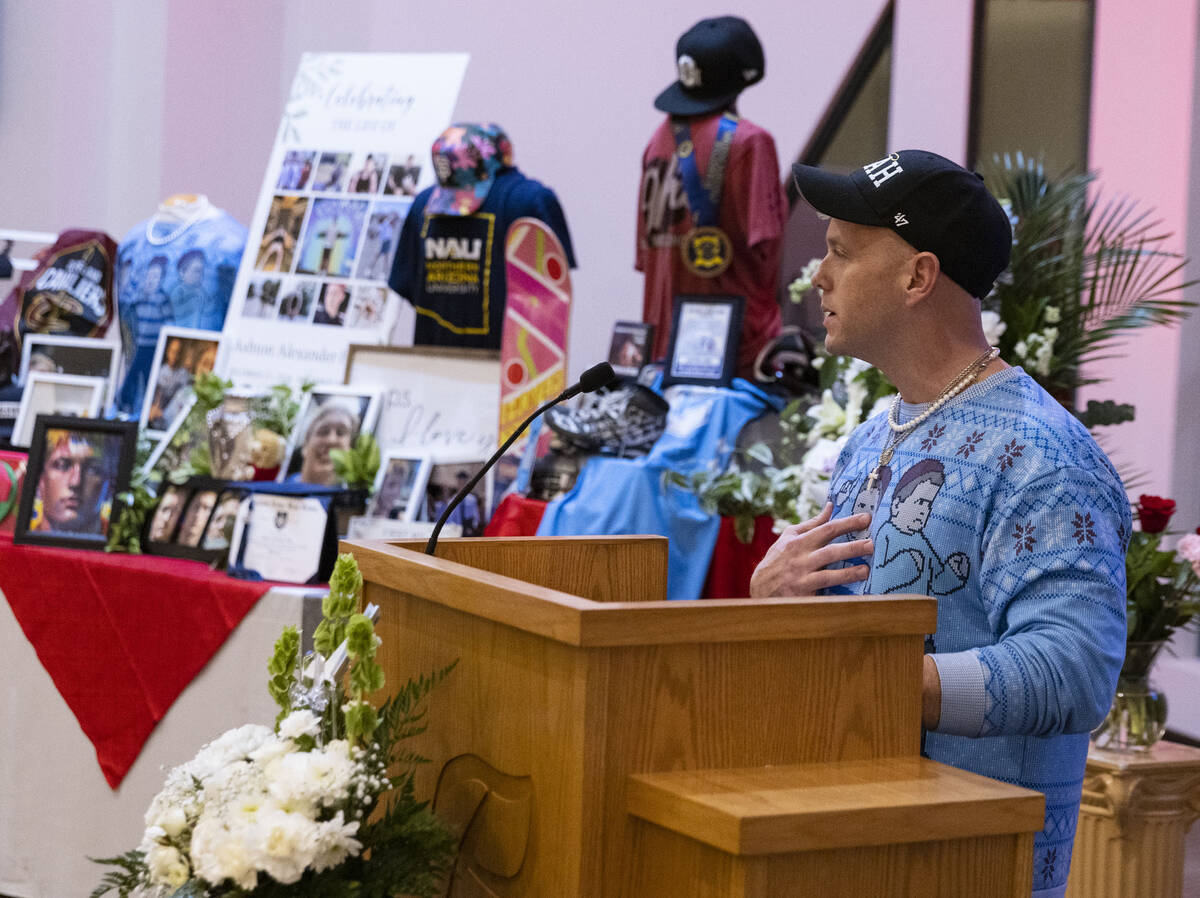 Officer Mark Hand, the father of Ashton Hynd, speaks during a memorial service at Palm Northwes ...