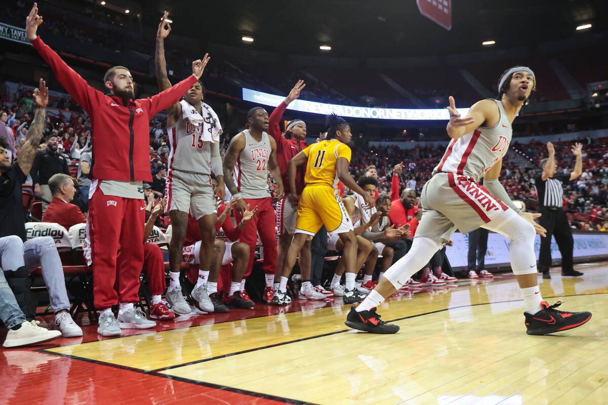 UNLV Rebels guard Justin Webster, right, reacts after a three-point basket against the Southern ...