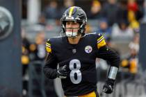 Pittsburgh Steelers quarterback Kenny Pickett (8) is introduced before an NFL football game, Su ...