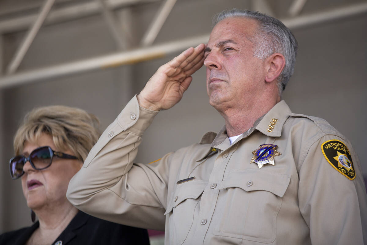 Clark County Sheriff Joe Lombardo salutes as the national anthem is sung during a Sept. 11 reme ...