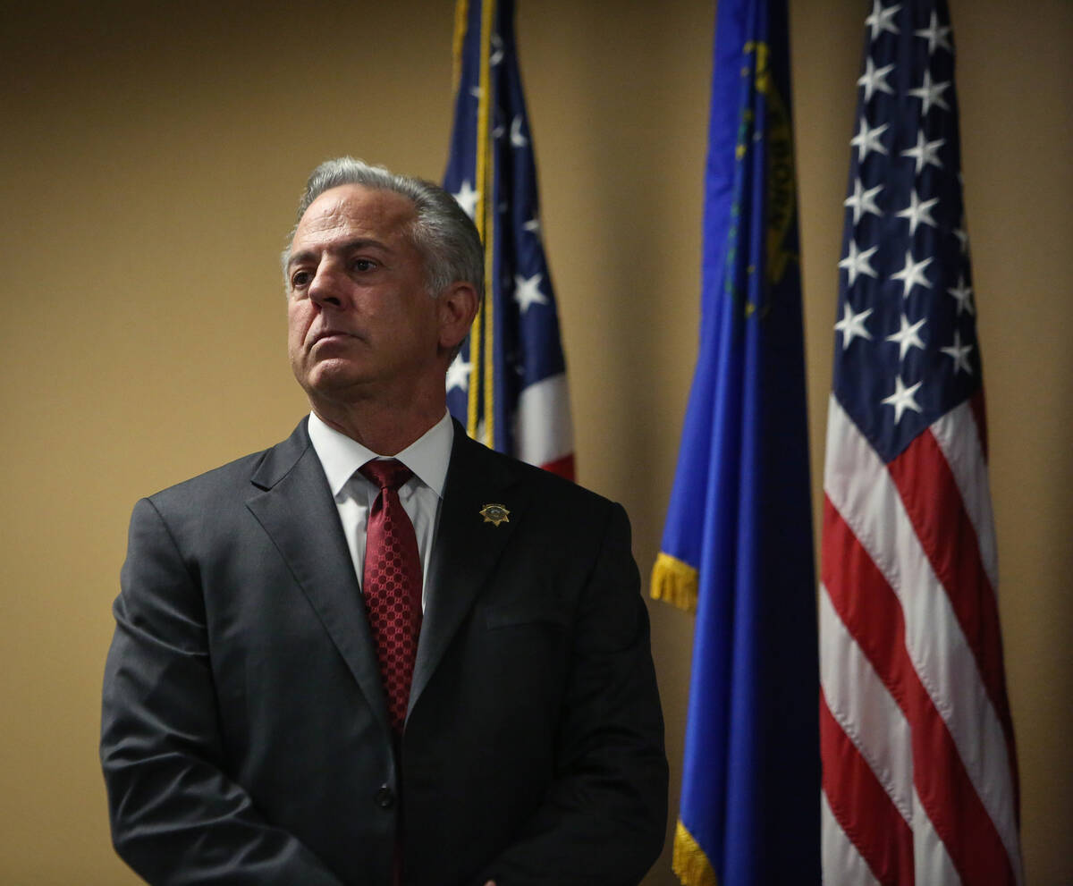 Clark County Sheriff Joe Lombardo stands on stage as he presents various law enforcement office ...