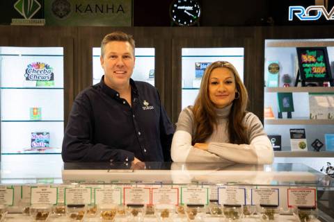 Kema Ogden, right, and John Heishman, left, owners of Top Notch THC, pose for a portrait on Fri ...