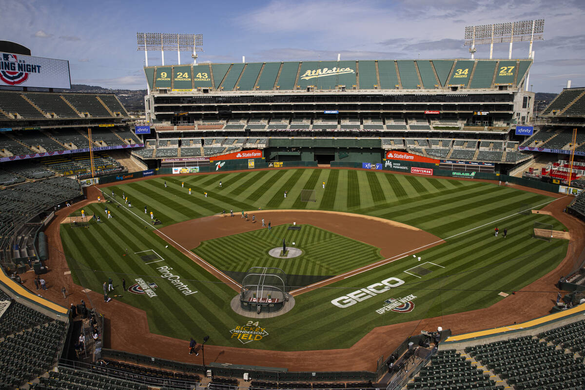 The Oakland Athletics warm up before the opening night game against the Baltimore Orioles on Mo ...